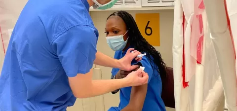 Dr Bayo gets her vaccine